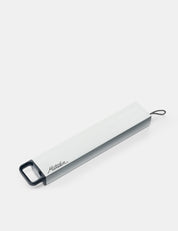 Metal pill canister on a white background